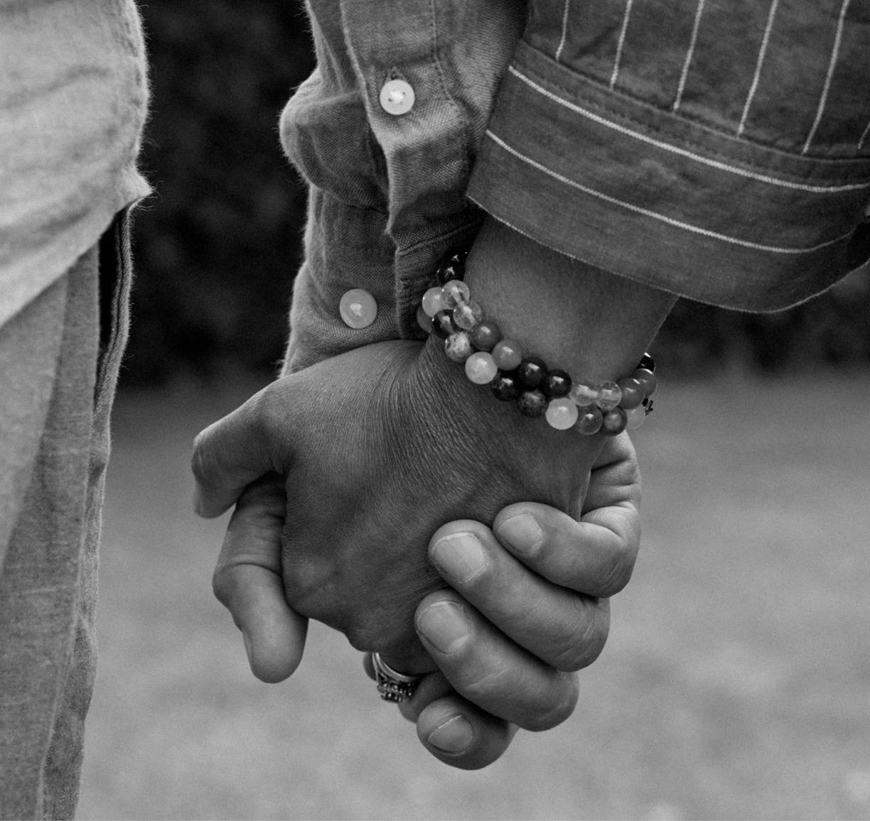 Women holding hands