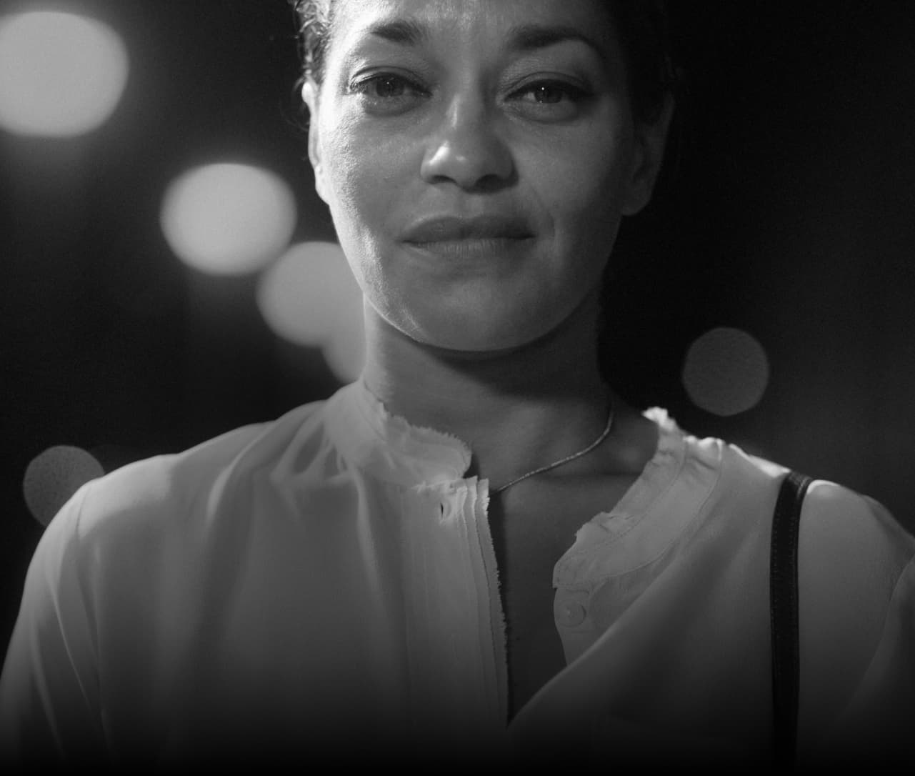 Photo of a woman looking straight ahead. The photo reads, “I'M A CHEATER.”