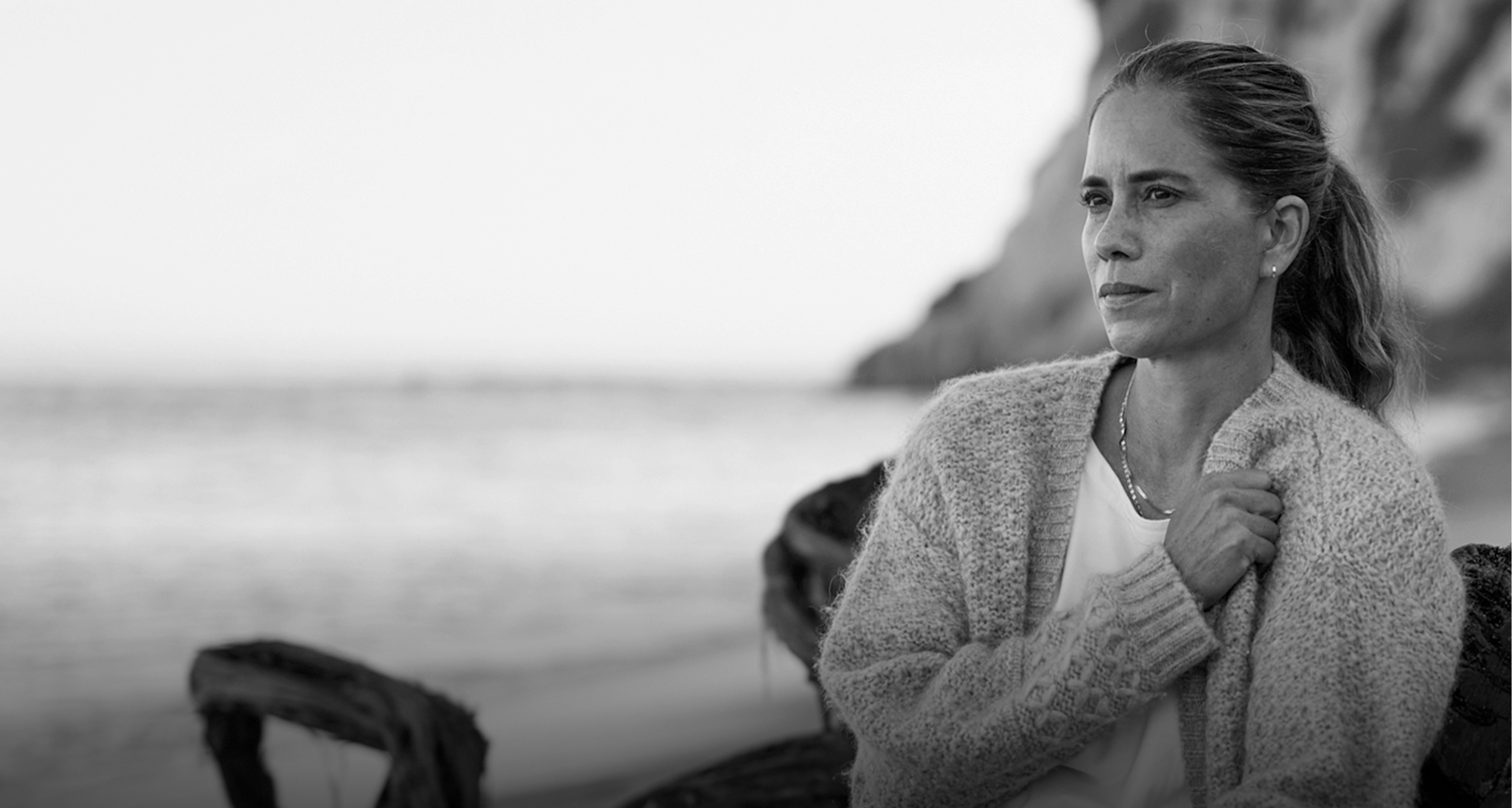 Woman holding sweater