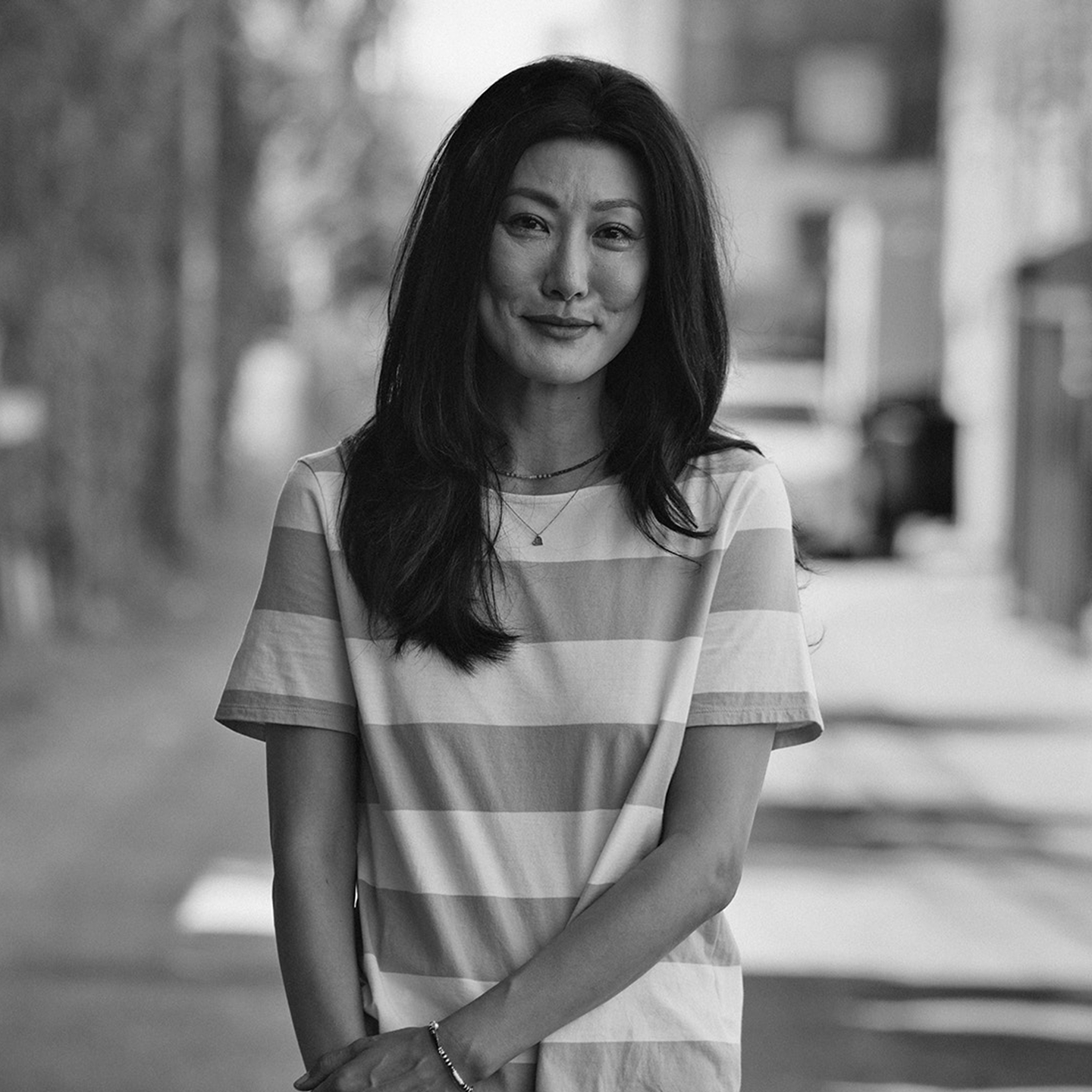 Woman outside smiling