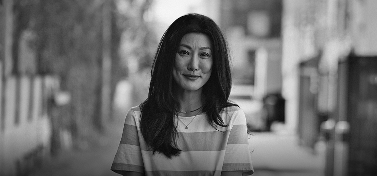 Woman outside smiling