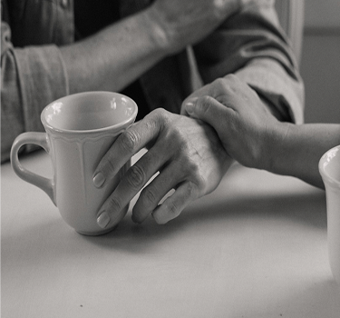 Man and woman drinking coffee